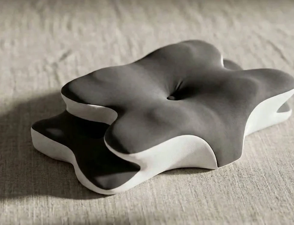 The Numa Pillow: charcoal butterfly contour with raised side wings